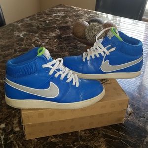 Blue-gray and white high top nikes